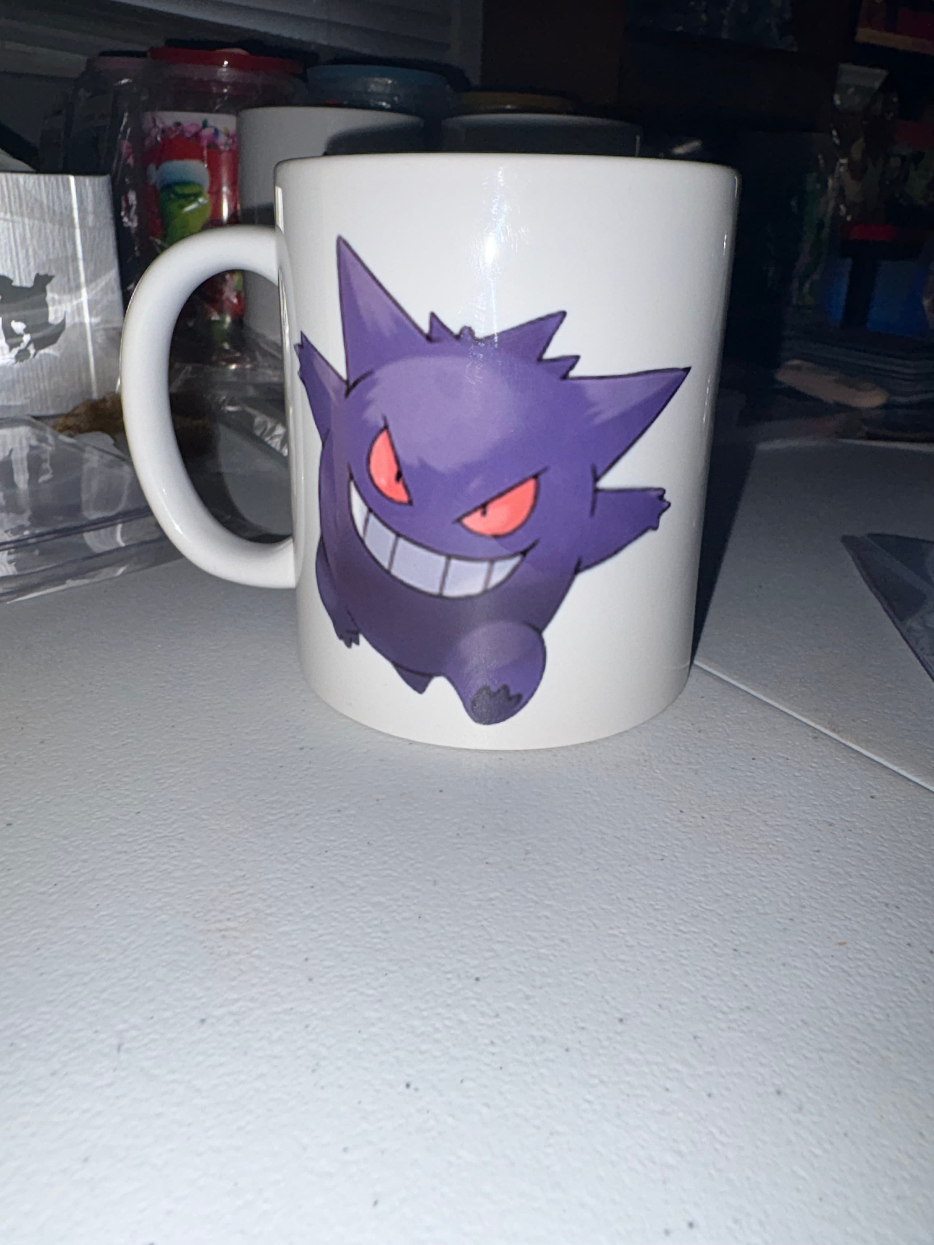 Gengar-inspired mug with TeePulls Logo